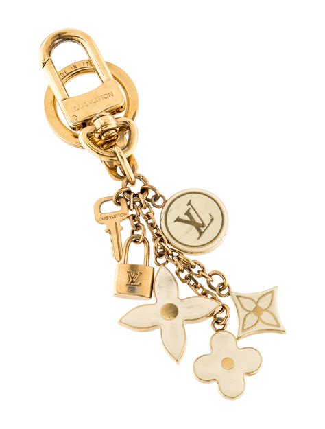 lv purse charms|Lv accesories.